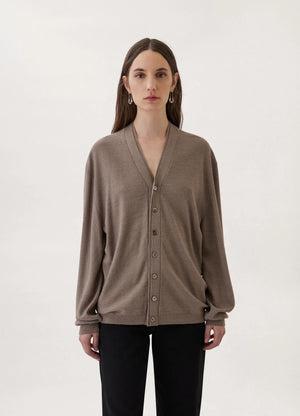 Loosely crafted cardigan in heather taupe knit, model shot, front view loose fit silhouette